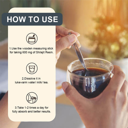 Hand holding a wooden measuring stick over a glass of dark liquid with text on how to use Shilajit Resin.